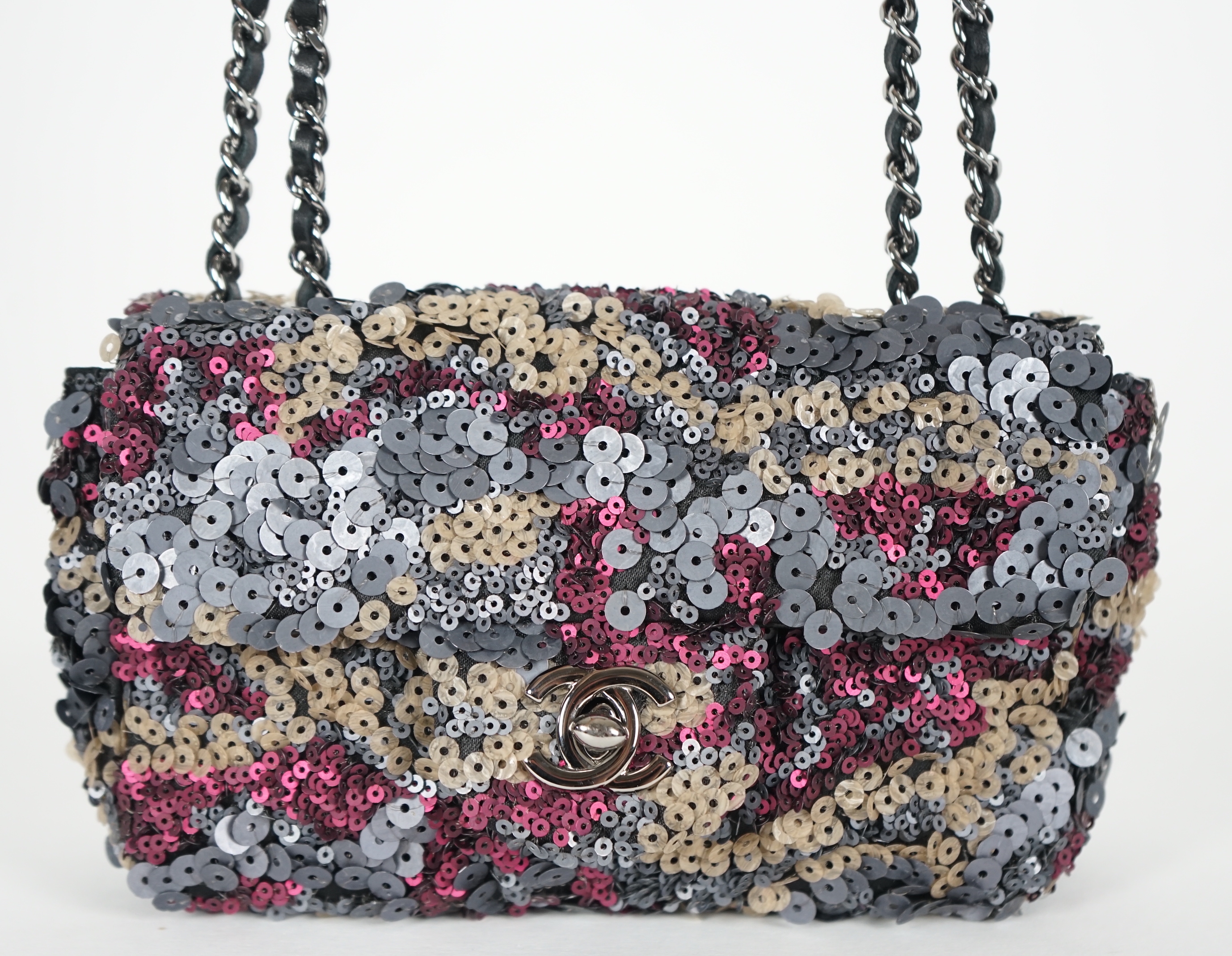 A Chanel 2012 Classique sequined mini shoulder bag, height 11cm, height overall 36cm, width18cm, depth 6.5cm, Please note this lot attracts an additional import tax of 20% on the hammer price